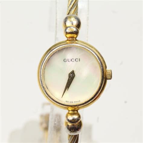 gucci mother of pearl bangle watch|gucci watch interchangeable faces.